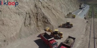 Видео: Минтранс расчищает последствия оползня в Бооме